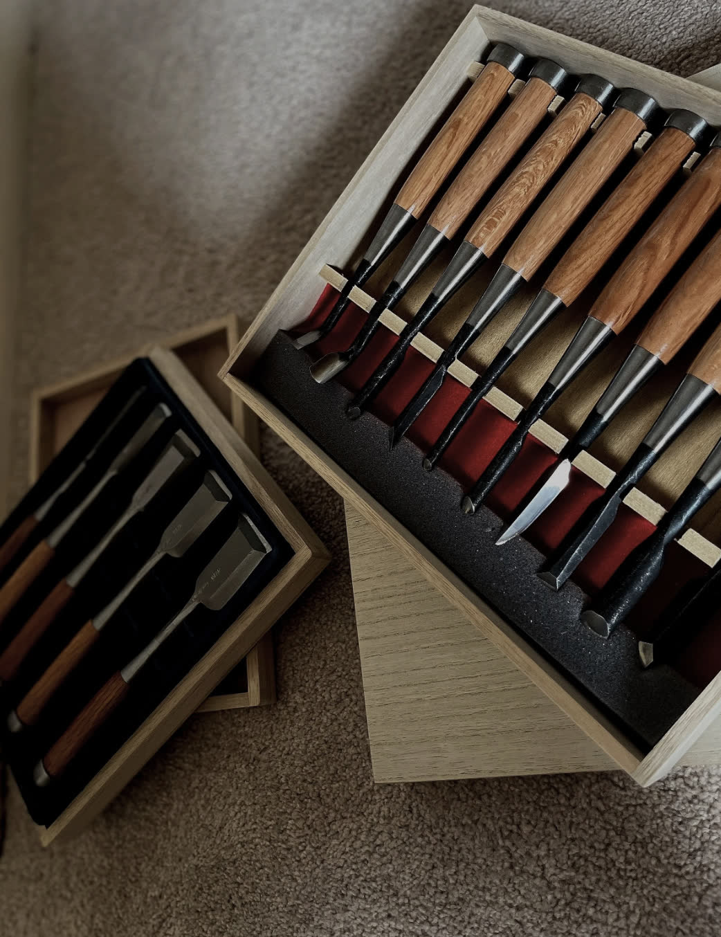Japanese chisel sets in their timber boxes, the hand tools behind Tillow Built's joinery
