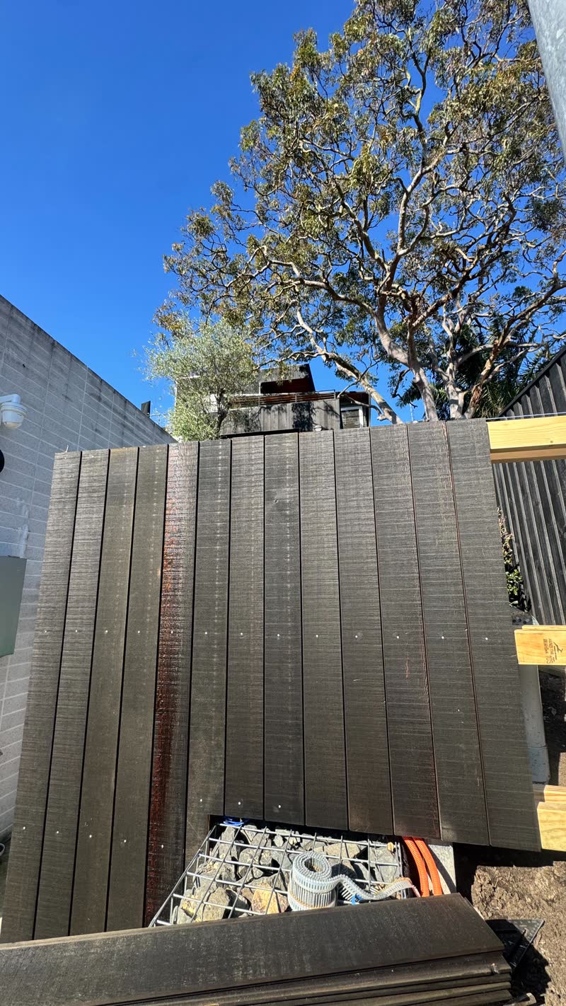 Timber slat privacy screen, completed by Tillow Built